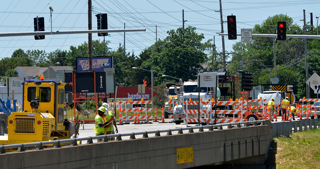 Construction workers begin rehabilitation efforts on the bridge
